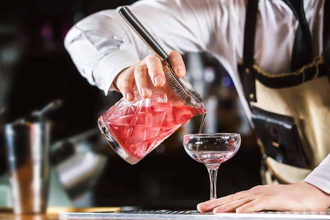Bartender pouring a drink
